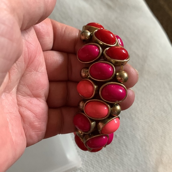 4 Bracelets Silver one can hold charms. Pinkish colored one from Holts. - Picture 2 of 6